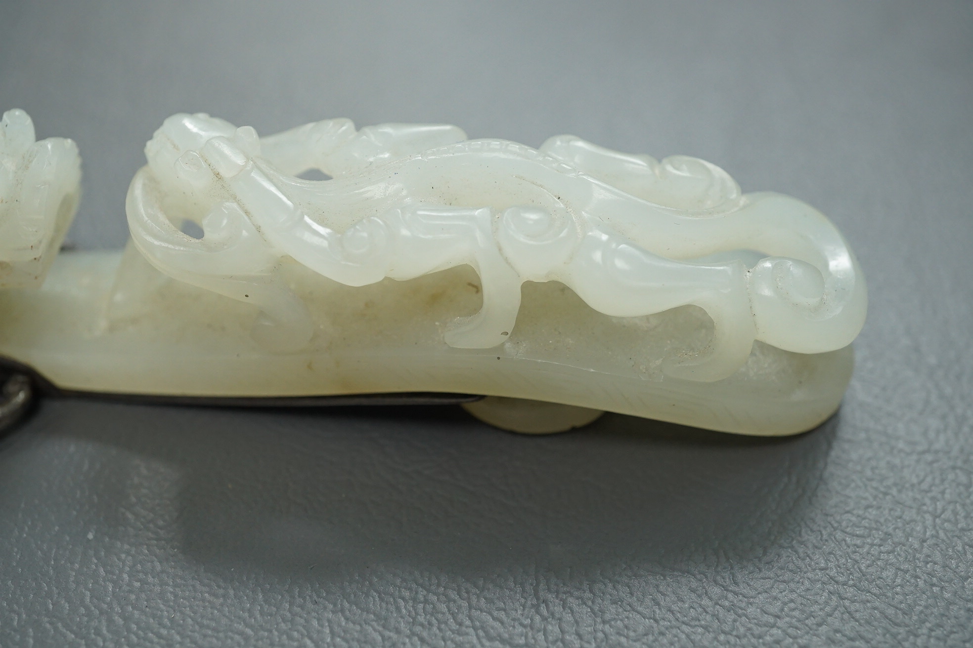 A Chinese jade and cabochon mounted hand mirror, the jade 18th/19th century